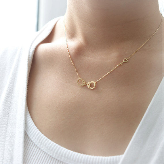 Handcuff and heart key gold necklace