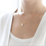 Crescent moon and tiny star necklace