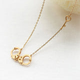 Handcuff and heart key gold necklace