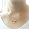 Partners in Crime Handcuffs necklace